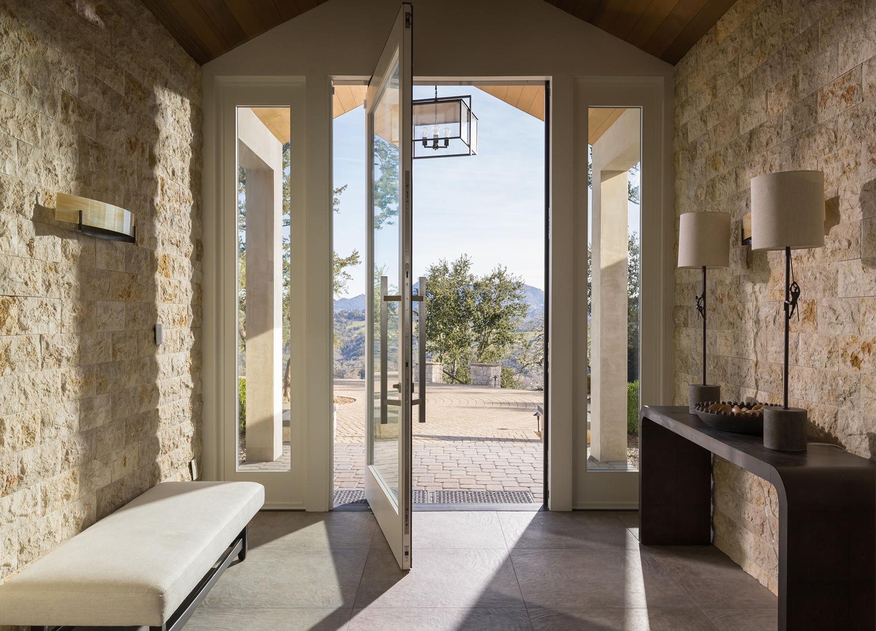 Sunlit entryway with open door